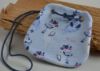 Bild von Brustbeutel kleine Robbe blau/flieder