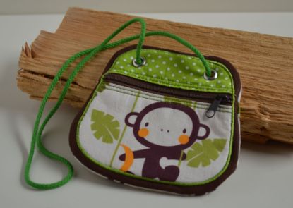 Bild von Brustbeutel Äffchen beige/grün